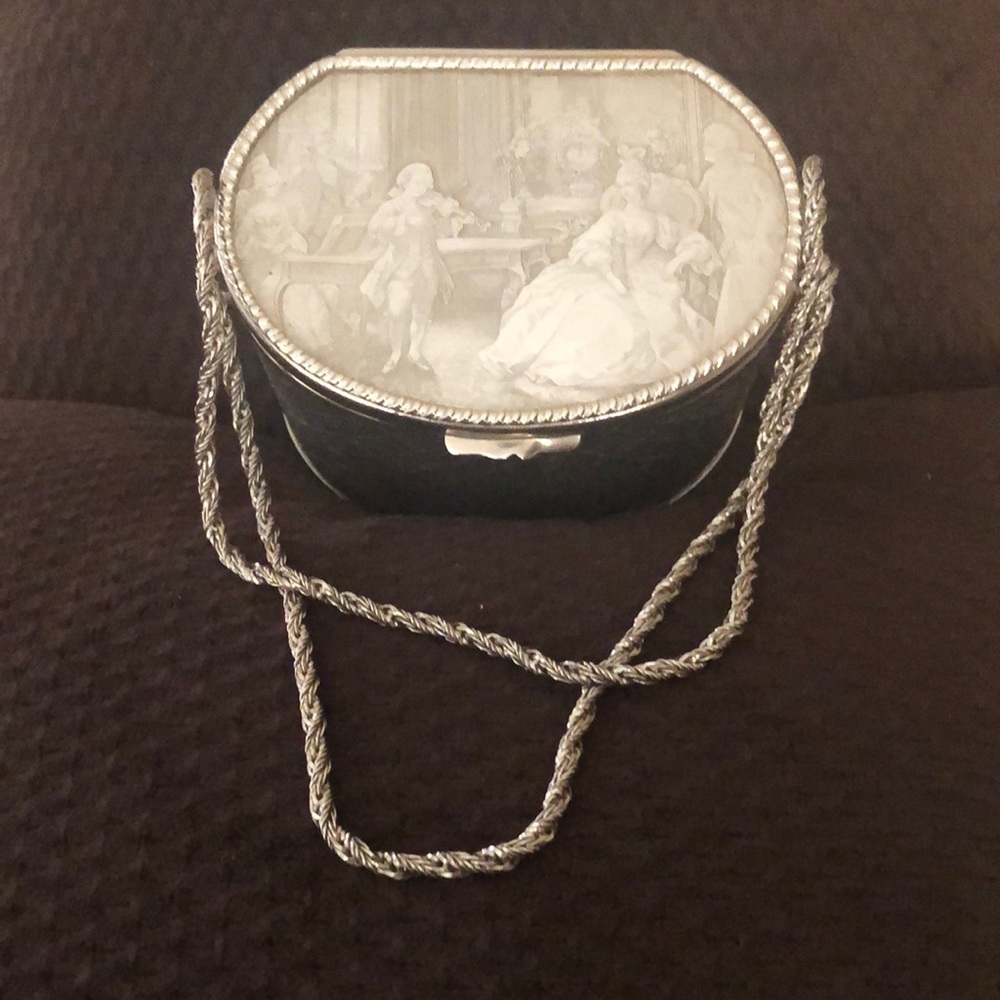 VINTAGE SAKS FIFTH AVENUE Opulent Italian silver metal minaudiere'.